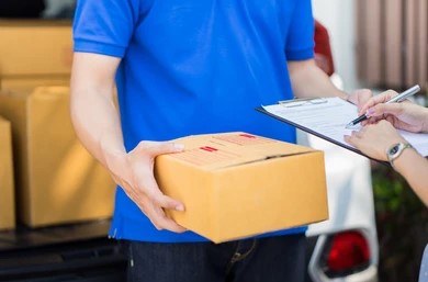 asian woman receiving package home 260nw 635504669 1